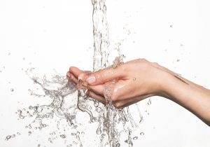 water-flowing-into-hands